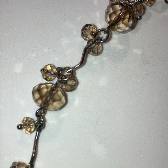 Lightly Tinted Gold Beaded Necklace with a small dangle. - Picture 3 of 4